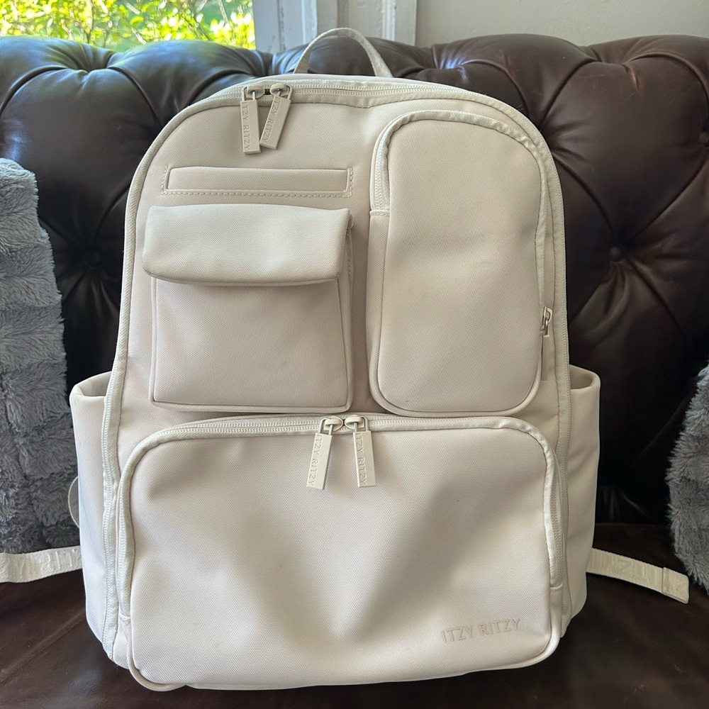 Itzy Ritzy Belong Cream Backpack with Ample Storage and Minimalist Design